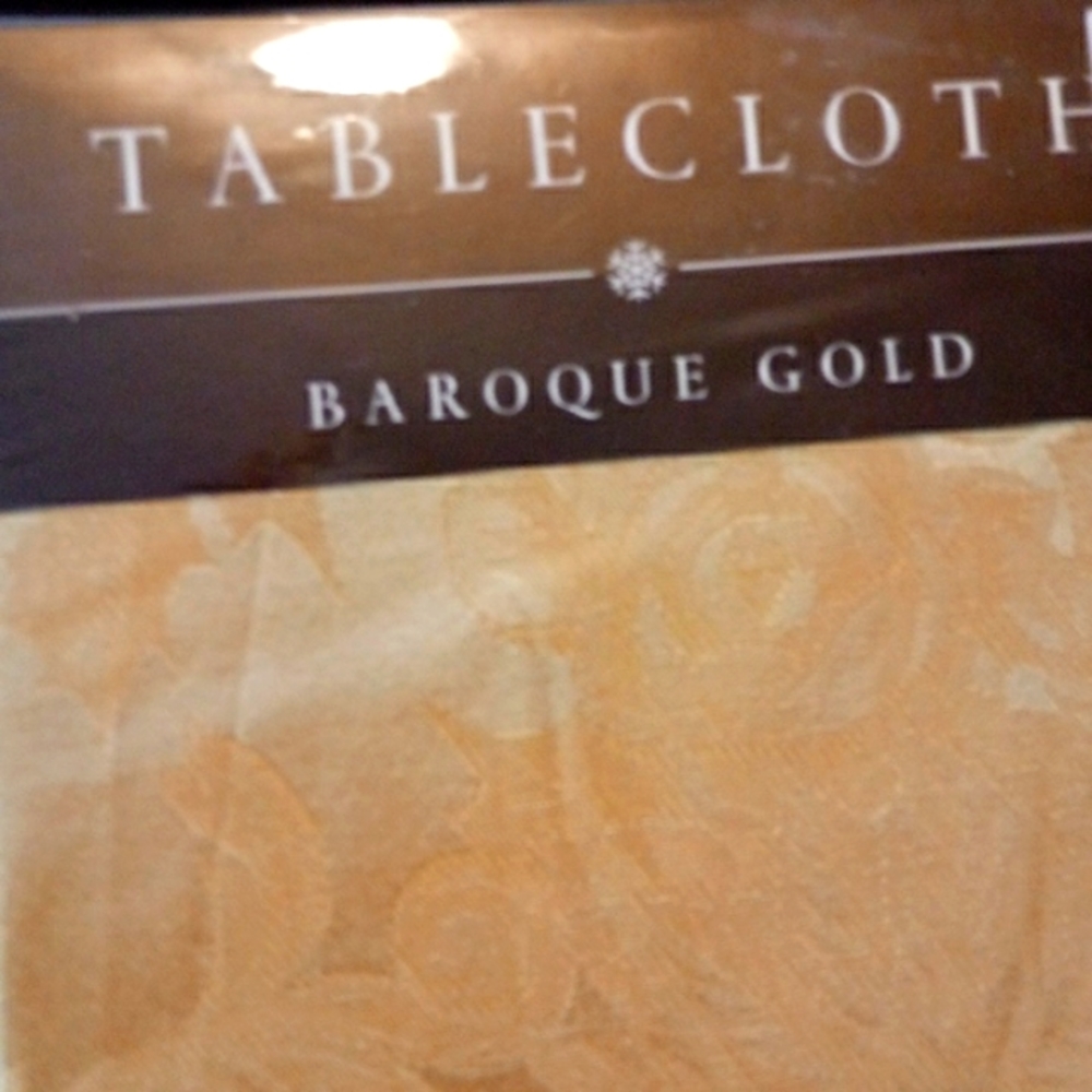 NWT -NEVER OPENED!!  70 in round
